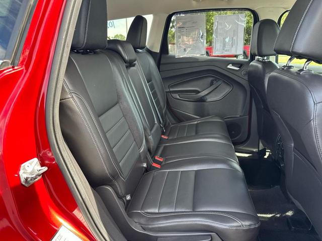 Photo of 2016 Ruby Red Metallic Tinted Clearcoat Ford Escape