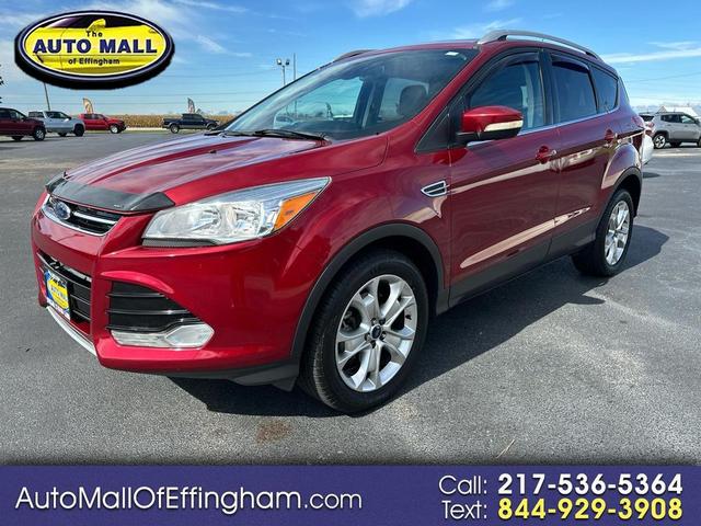 Photo of 2016 Ruby Red Metallic Tinted Clearcoat Ford Escape