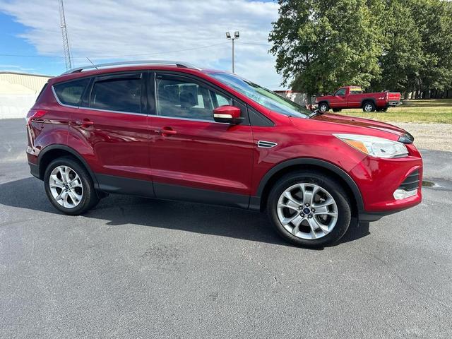 Photo of 2016 Ruby Red Metallic Tinted Clearcoat Ford Escape