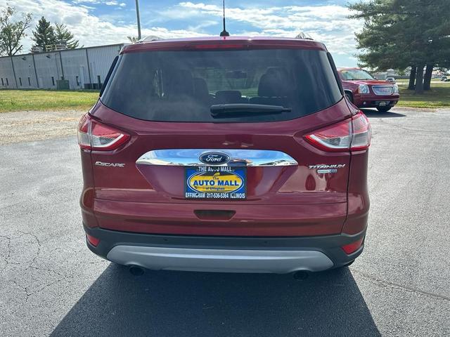 Photo of 2016 Ruby Red Metallic Tinted Clearcoat Ford Escape
