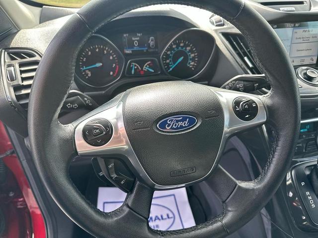 Photo of 2016 Ruby Red Metallic Tinted Clearcoat Ford Escape