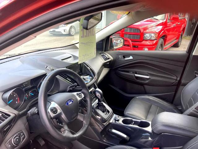 Photo of 2014 Ruby Red Tinted Clearcoat Ford Escape