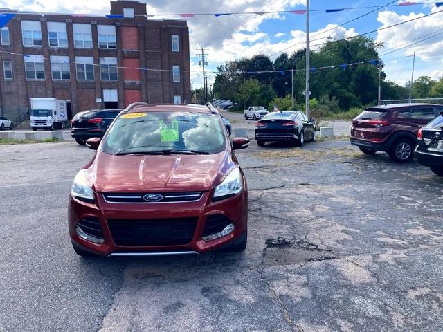 Photo of 2014 Ruby Red Tinted Clearcoat Ford Escape