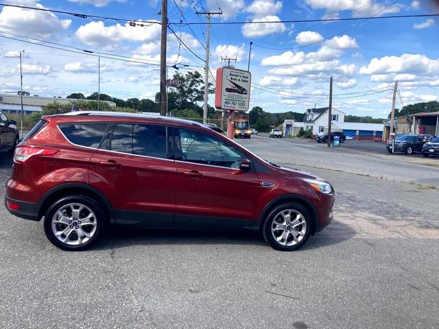 Photo of 2014 Ruby Red Tinted Clearcoat Ford Escape