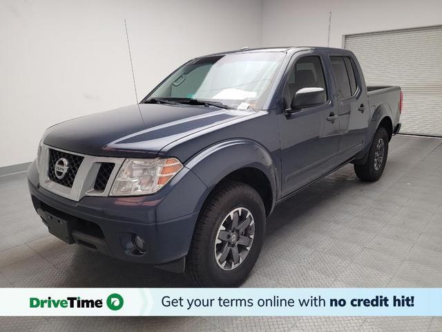 Photo of 2015 Arctic Blue Metallic Nissan Frontier