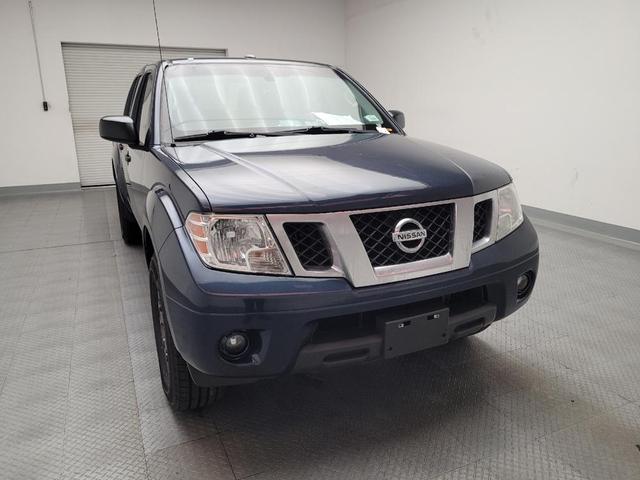 Photo of 2015 Arctic Blue Metallic Nissan Frontier