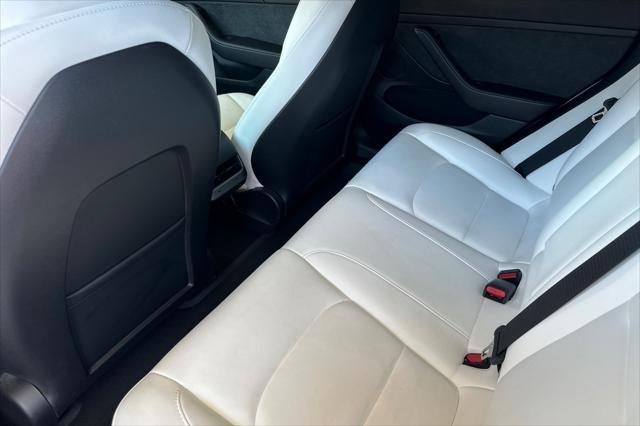 Photo of 2023 Pearl White Multi-Coat Tesla Model 3