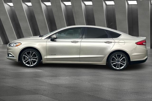 Photo of 2017 White Gold Ford Fusion Hybrid