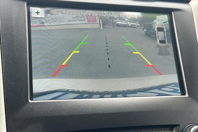 Photo of 2017 White Gold Ford Fusion Hybrid