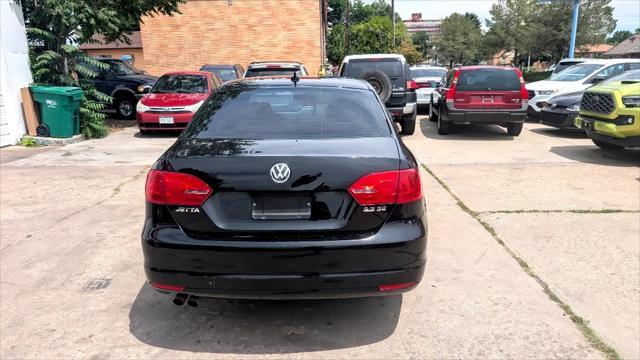 Photo of 2013 Black Uni Volkswagen Jetta