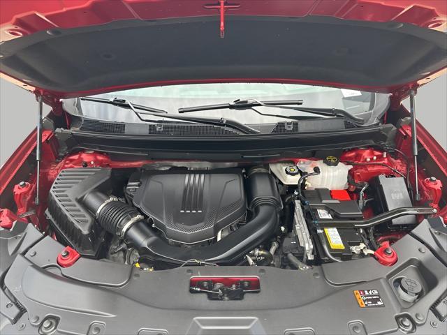 Photo of 2024 Volcanic Red Tintcoat GMC Acadia