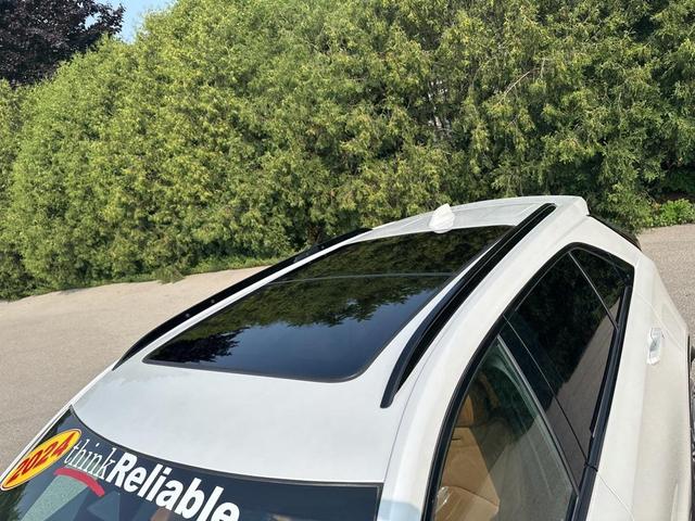 Photo of 2024 Crystal White Tricoat Cadillac XT4