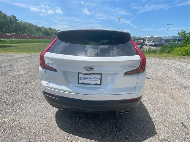 Photo of 2023 Crystal White Tricoat Cadillac XT4