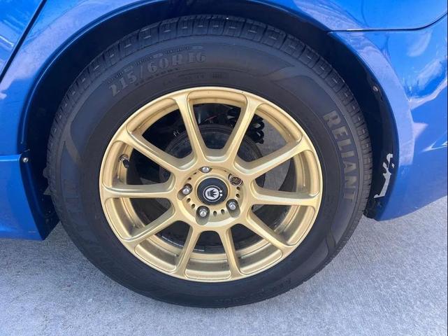 Photo of 2015 Octane Blue Pearl Mitsubishi Lancer