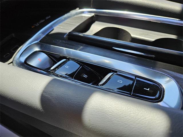 Photo of 2024 Cherry Red Tintcoat Buick Enclave