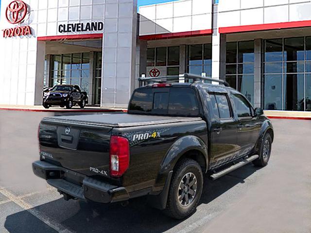 Photo of 2016 Magnetic Black Nissan Frontier
