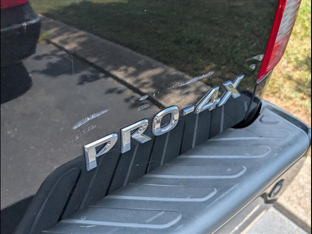 Photo of 2016 Magnetic Black Nissan Frontier
