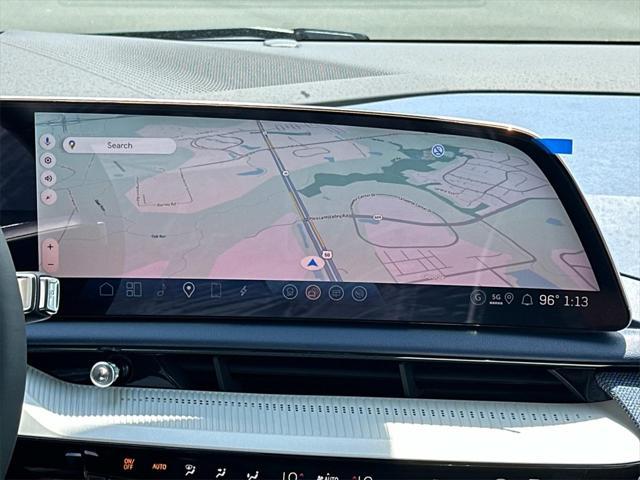Photo of 2025 Coastal Blue Metallic Cadillac OPTIQ