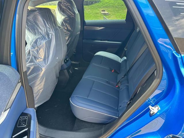 Photo of 2025 Coastal Blue Metallic Cadillac OPTIQ