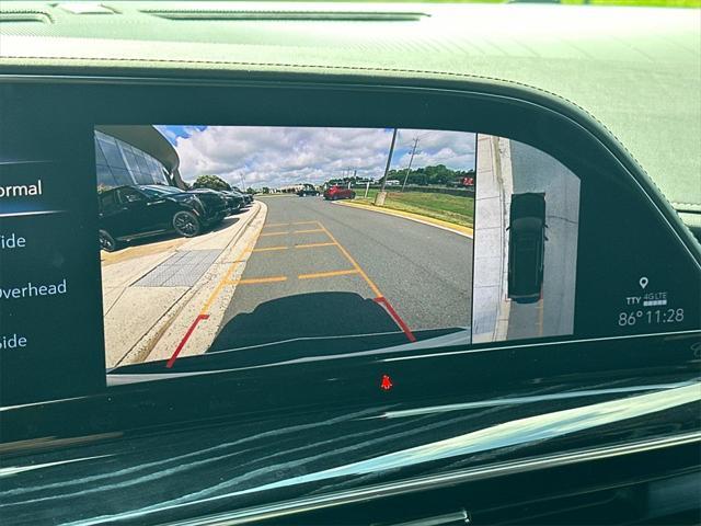 Photo of 2021 Crystal White Tricoat Cadillac Escalade ESV