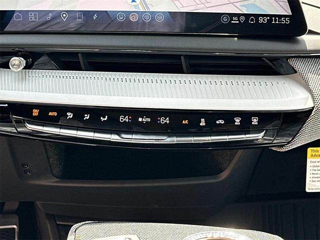 Photo of 2025 Monarch Orange Cadillac OPTIQ