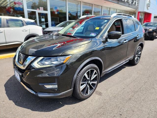 Photo of 2017 Midnight Jade Nissan Rogue
