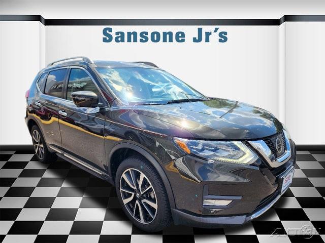 Photo of 2017 Midnight Jade Nissan Rogue