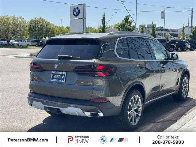 Photo of 2026 Manhattan Green Metallic BMW X5