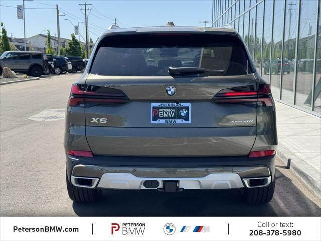 Photo of 2026 Manhattan Green Metallic BMW X5