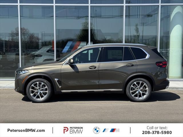 Photo of 2026 Manhattan Green Metallic BMW X5