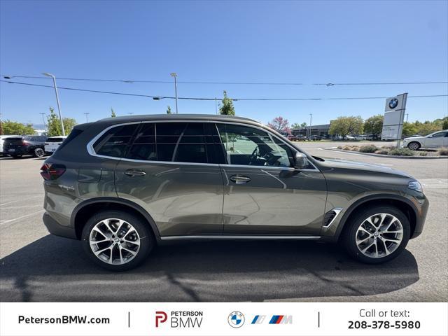 Photo of 2026 Manhattan Green Metallic BMW X5