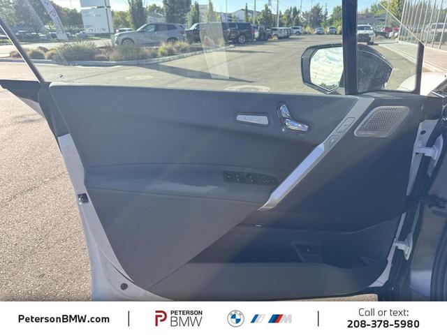 Photo of 2026 Mineral White Metallic BMW iX