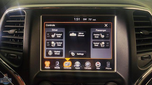 Photo of 2016 Ivory Jeep Grand Cherokee
