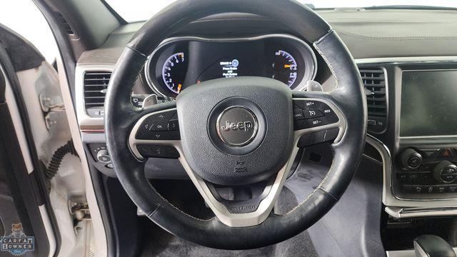 Photo of 2016 Ivory Jeep Grand Cherokee