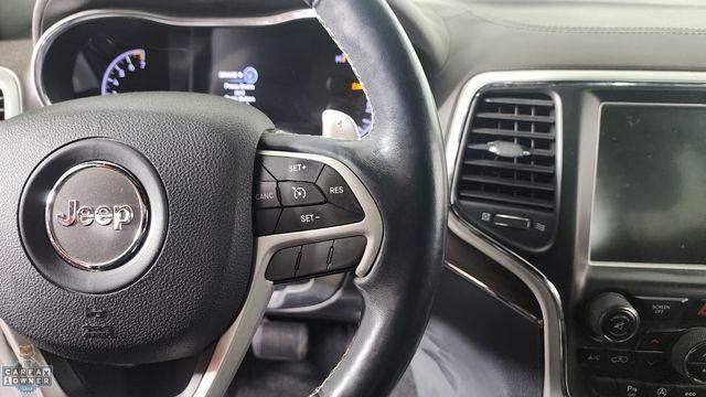Photo of 2016 Ivory Jeep Grand Cherokee