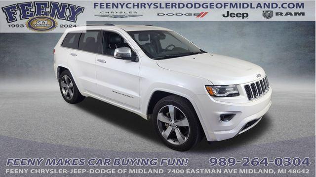 Photo of 2016 Ivory Jeep Grand Cherokee