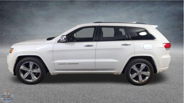 Photo of 2016 Ivory Jeep Grand Cherokee