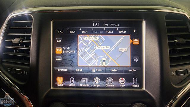 Photo of 2016 Ivory Jeep Grand Cherokee