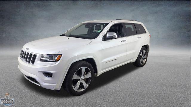 Photo of 2016 Ivory Jeep Grand Cherokee
