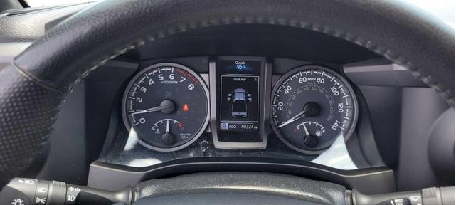Photo of 2021 Super White Toyota Tacoma