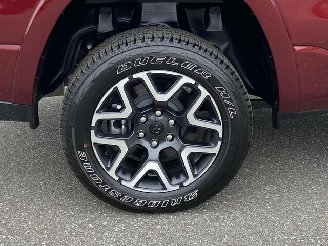 Photo of 2025 Delmonico Red Pearlcoat RAM 1500