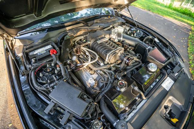 Photo of 2015 Black Ford Mustang