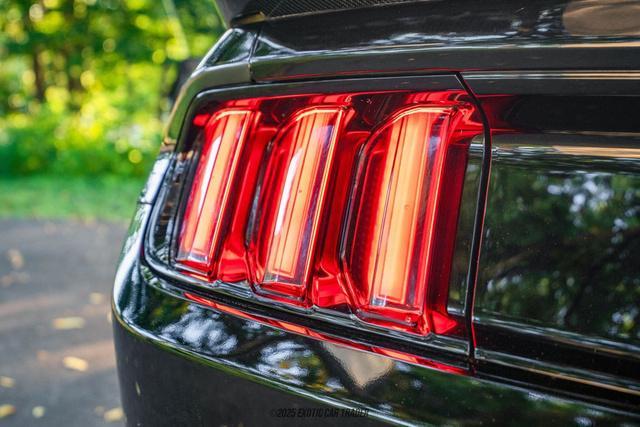 Photo of 2015 Black Ford Mustang