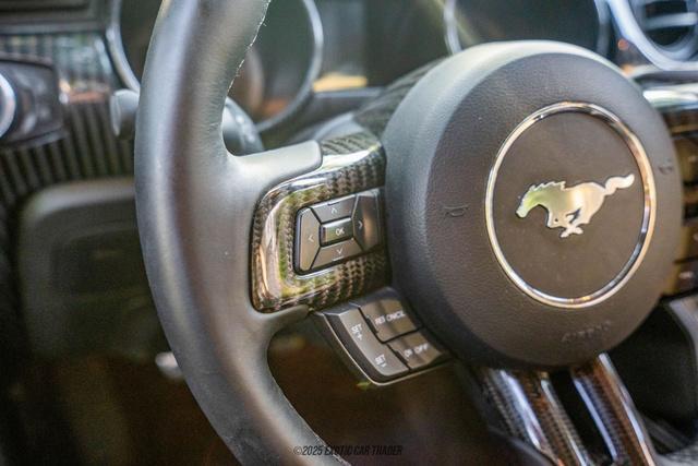 Photo of 2015 Black Ford Mustang