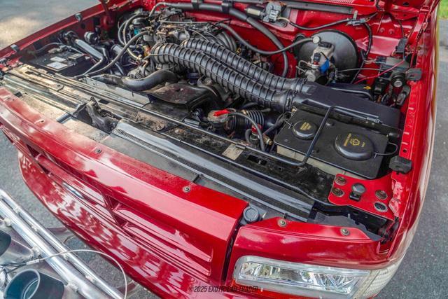 Photo of 1995 Red Ford Bronco
