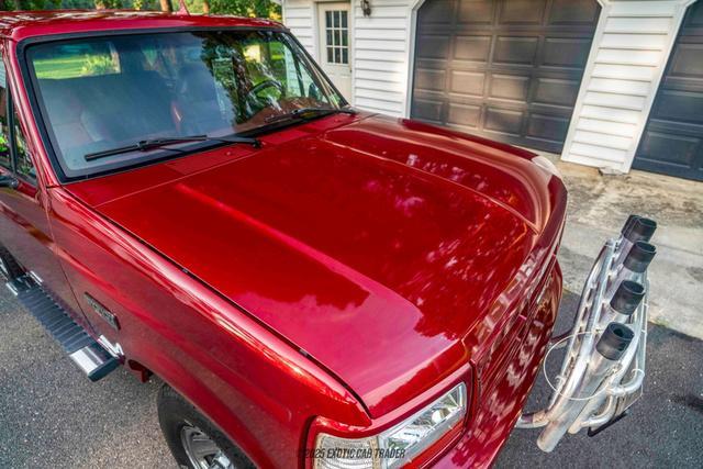 Photo of 1995 Red Ford Bronco