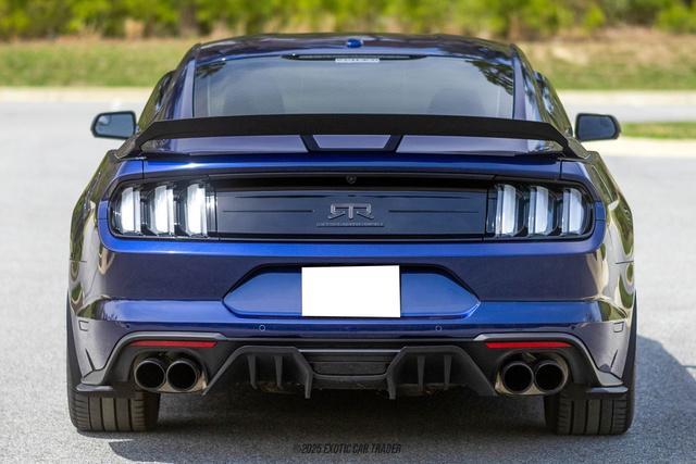 Photo of 2019 Kona Blue Ford Mustang