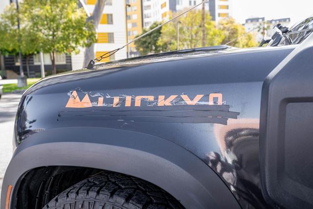 Photo of 2023 Santorini Black Metallic Land Rover Defender