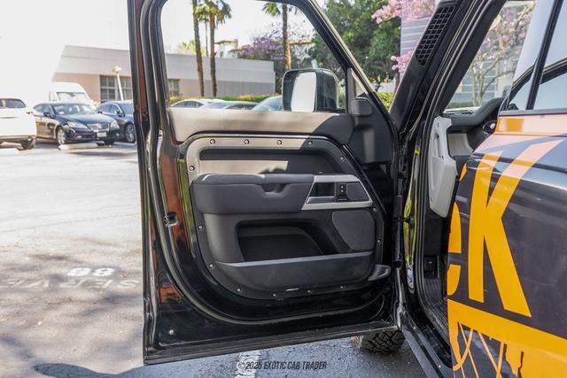 Photo of 2023 Santorini Black Metallic Land Rover Defender