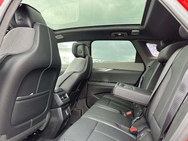 Photo of 2025 Monarch Orange Cadillac OPTIQ